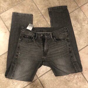 Vintage Levi’s 501 distressed boyfriend fit straight leg faded wash denim jean